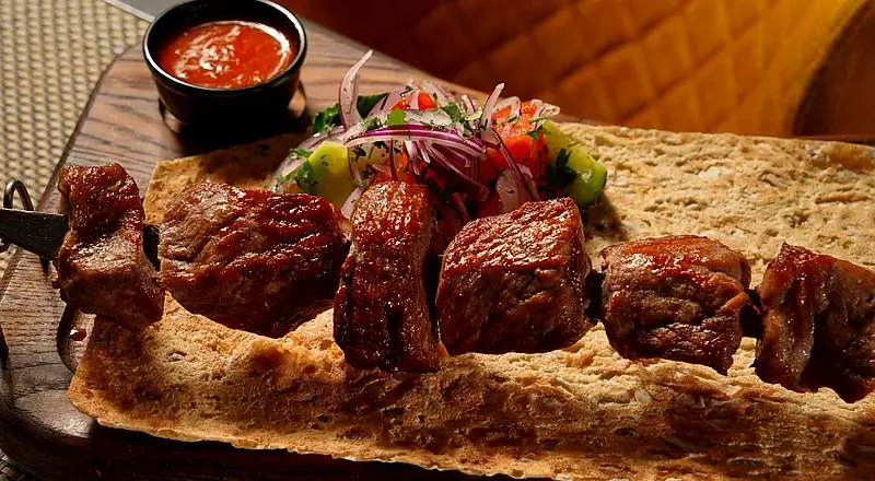 Georgian Mtsvadi grilled meat skewers — Georgian food guide