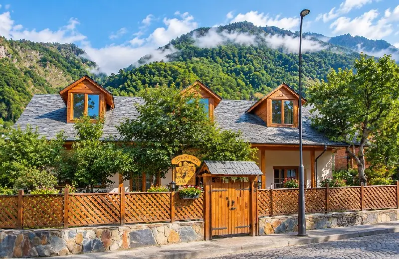 Traditional Svan guesthouse in Mestia with mountain view — Mestia travel guide