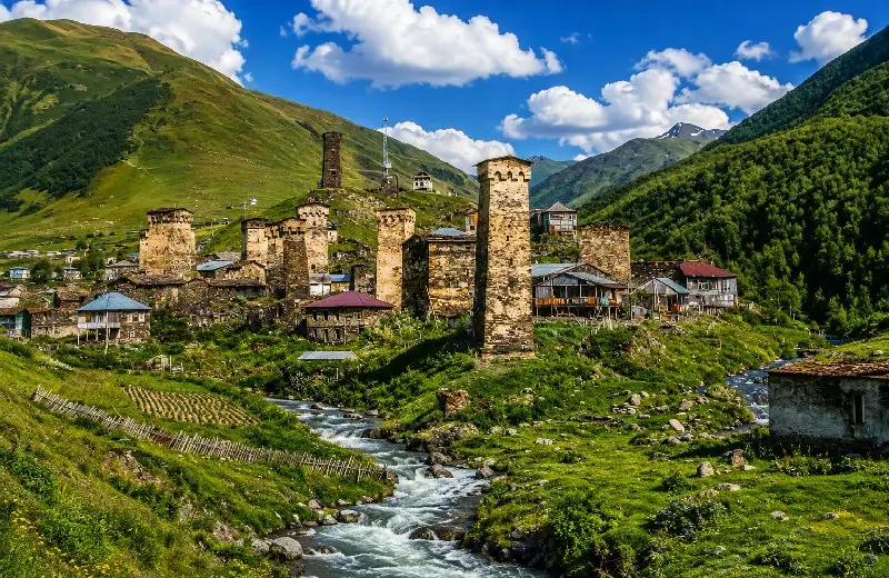 Svan towers in Mestia with stone architecture — Mestia travel guide